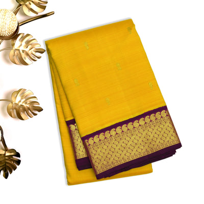 Mustard Kanchipuram Silk Saree with Small Zari Butta Design