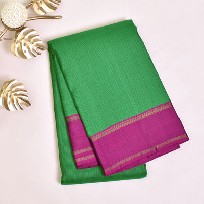 green-kanchi-silk-saree-with-purple-blouse