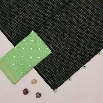 Black Kanchi Silk Saree with Kanchi Silk Tassels and Apple Green Kutch Work Embroidery Blouse