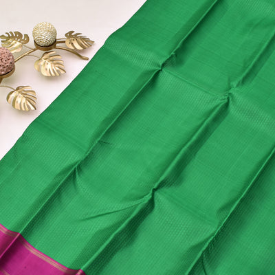 green-kanchi-silk-saree-with-purple-blouse