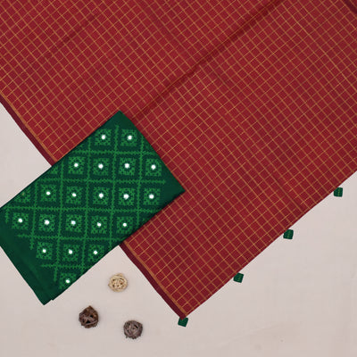 Arakku Thakkali Kanchi Silk Saree with Kanchi Silk Tassels and Bottle Green Kutch Work Embroidery Blouse