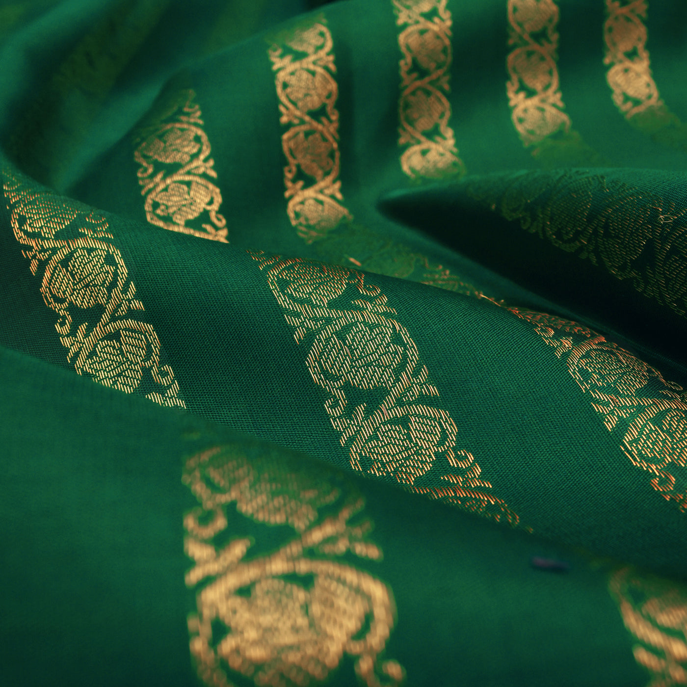 Bottle Green Kanchi Silk Fabric with Kodi Creeper Design