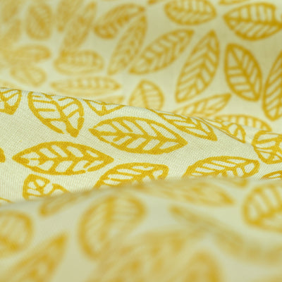 Off White Kanchi Silk Printed Fabric with Mustard Leaf Printed Design