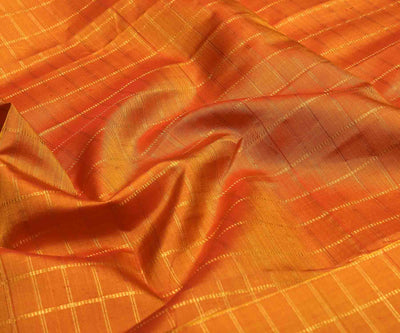 double-shade-orange-kanchi-silk-fabric-with-dotted-zari-checks