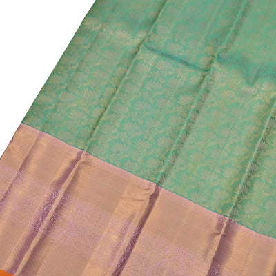 Pastel Green Kanchipuram Silk Saree with Lotus Design