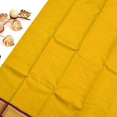 Mustard Kanchipuram Silk Saree with Small Zari Butta Design