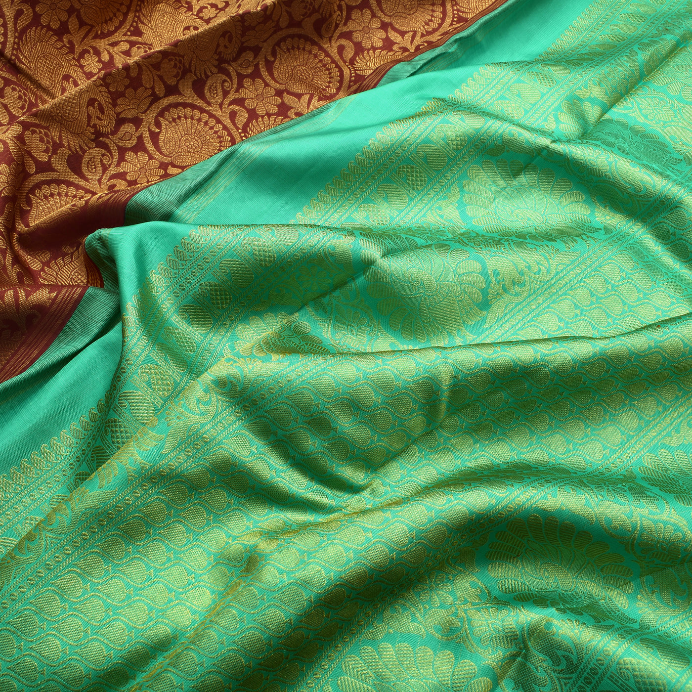 brown-kanchi-silk-saree-with-turquoise-blue-blouse