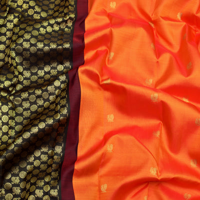 black-kanchi-silk-saree-with-orange-blouse