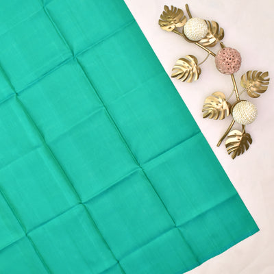 grey-printed-kanchi-silk-saree-with-turquoise-blue-blouse