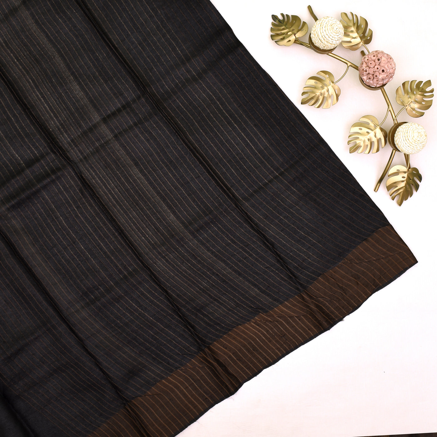 Black tussar silk saree with zari lines blouse