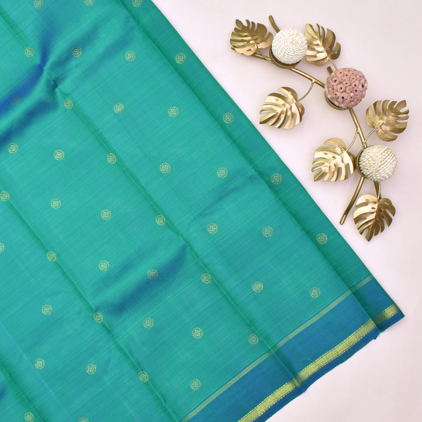 rexona-green-kanchi-silk-saree-with-dual-tone-rexona-blue-blouse